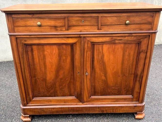Solid walnut sideboard of the Napoleon III period, late nineteenth century, Louis Philippe style