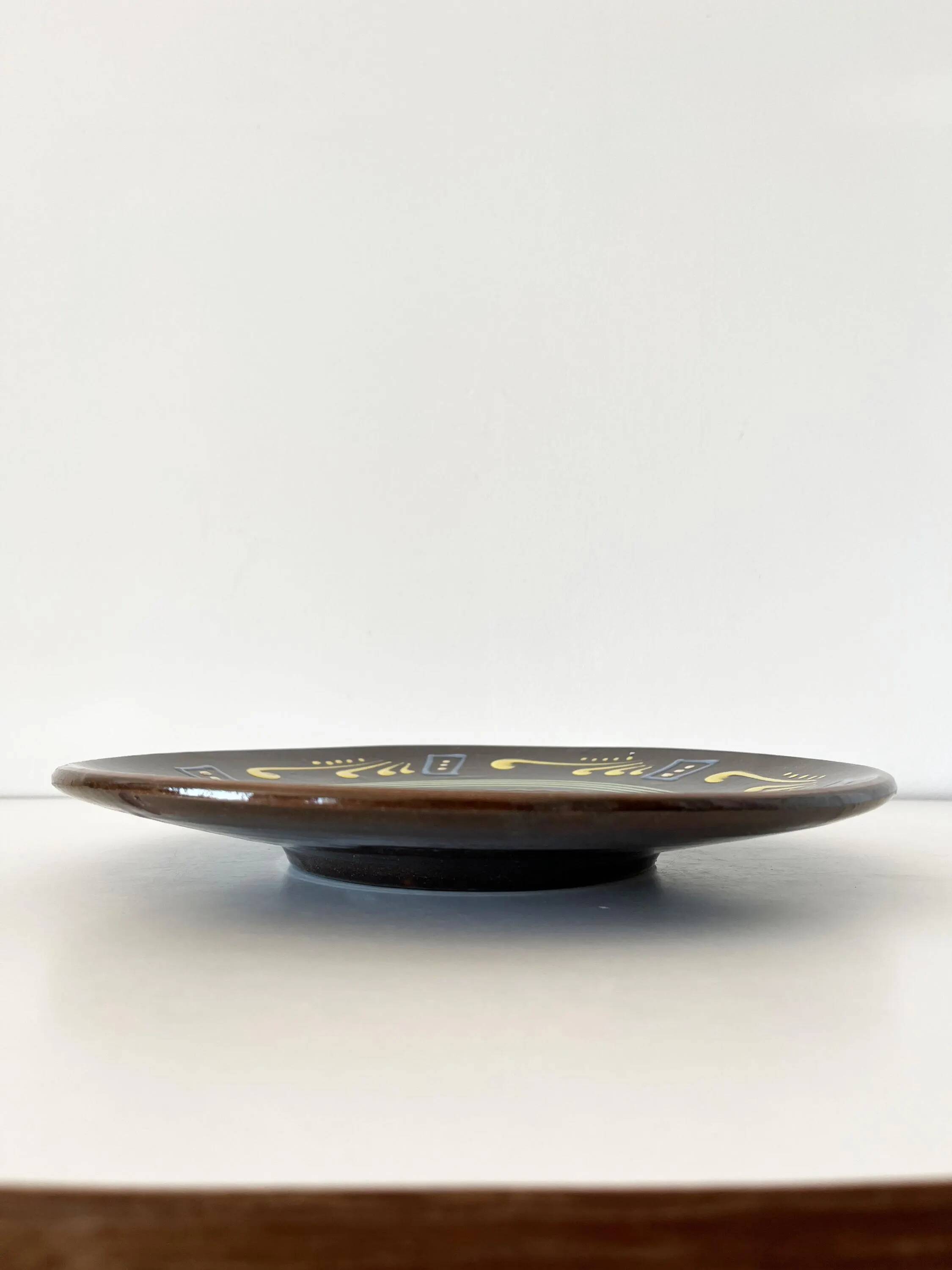 Large brown ceramic platter, 1960