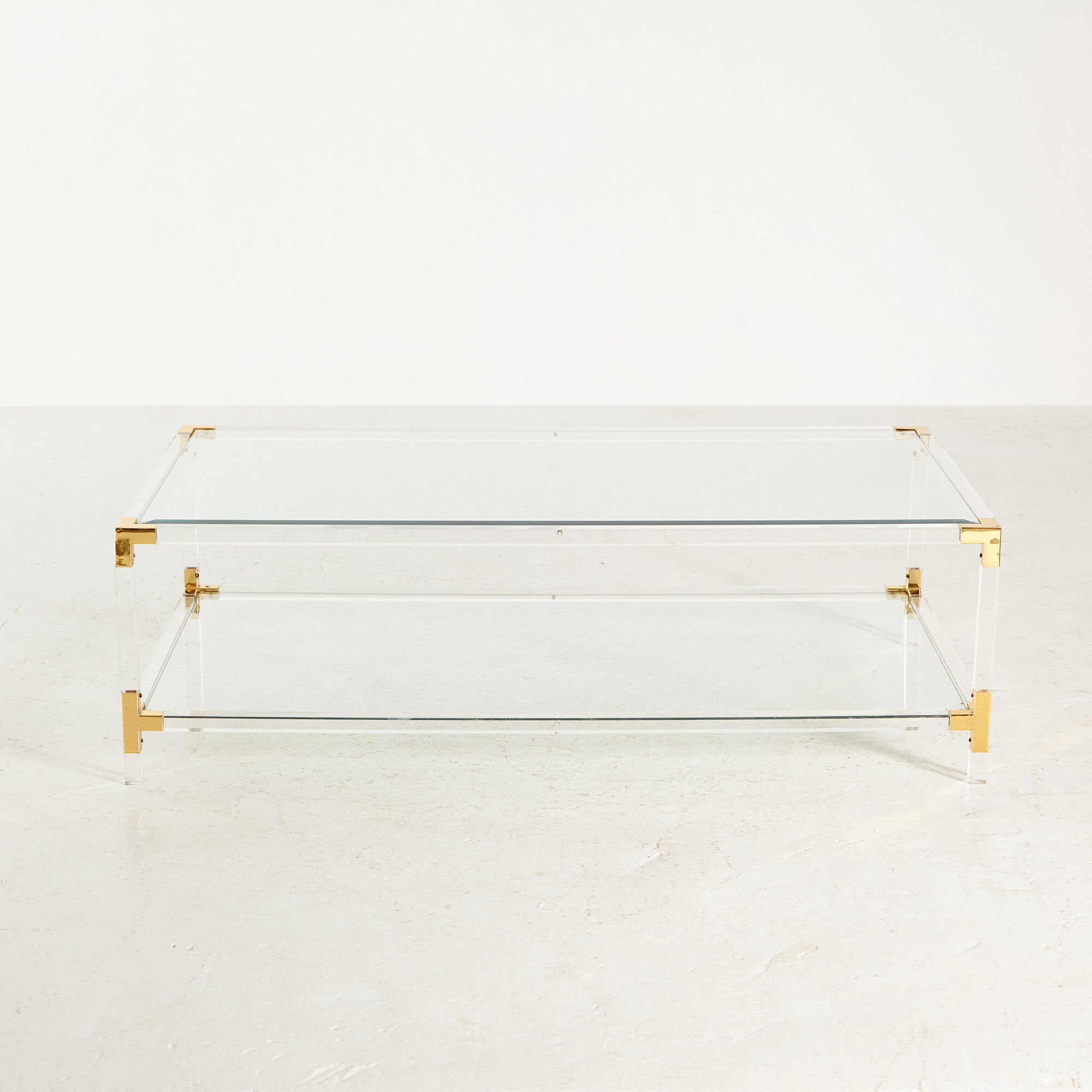 Glass and brass coffee table