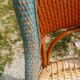 Pair of art deco garden chairs in patinated woven wicker