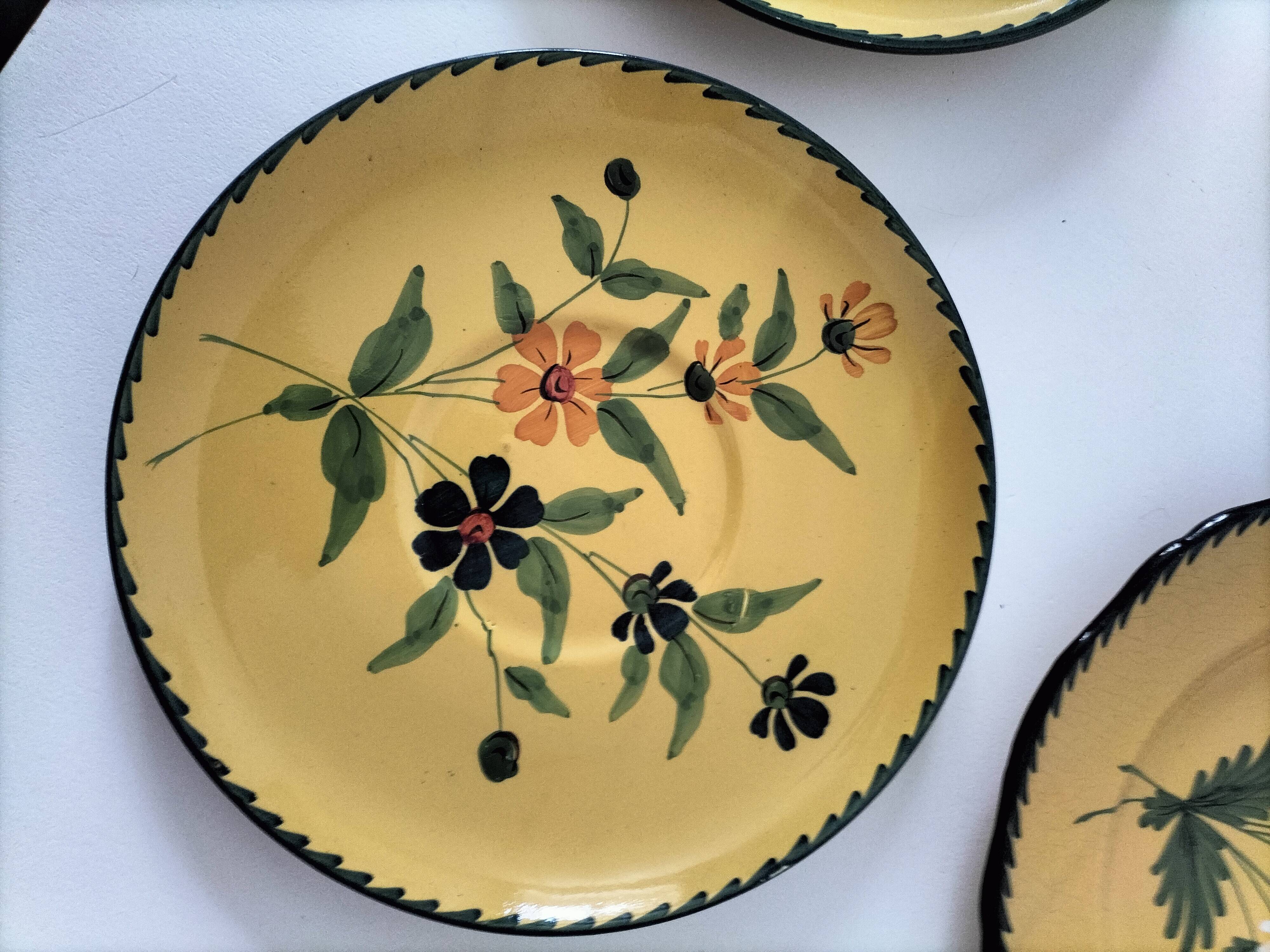 4 antique plates in hand-painted faience