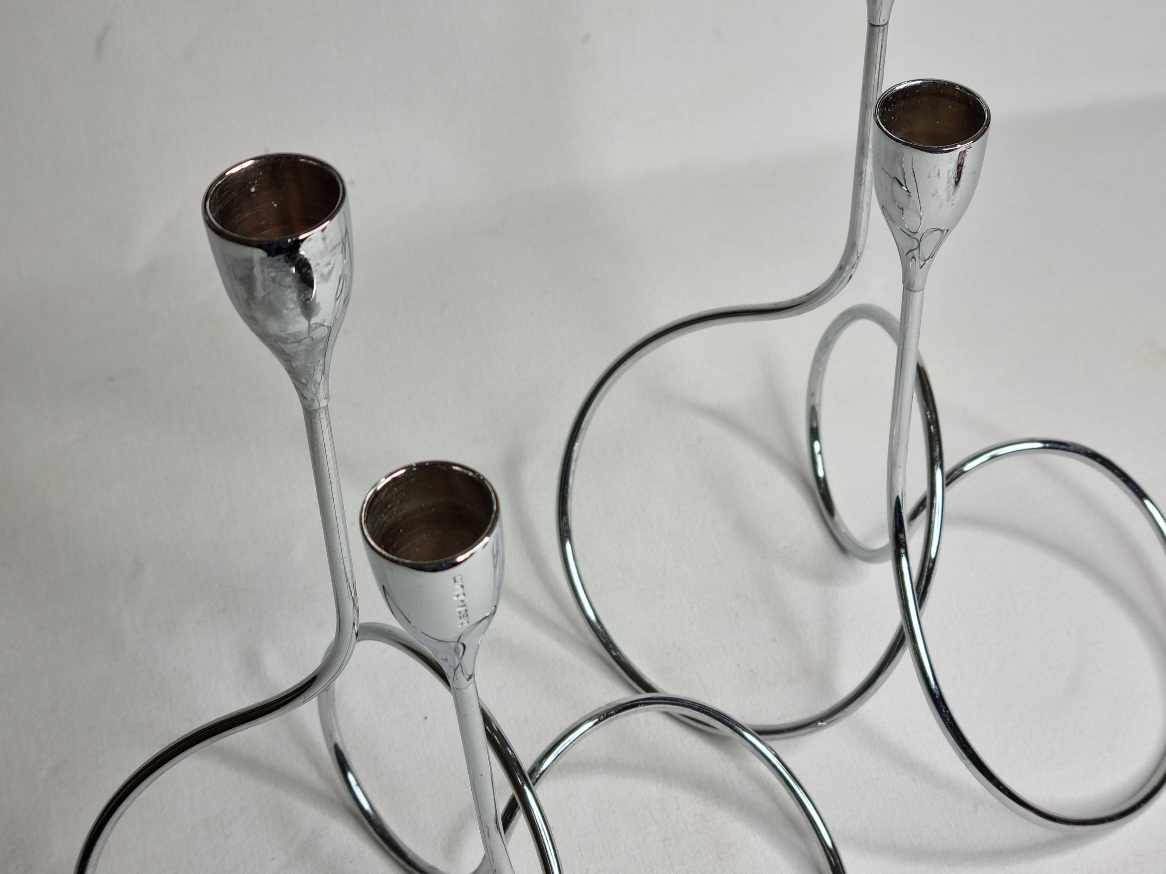 Pair of “Black & Blum” designer candlesticks in chrome-plated metal, 27 cm
