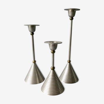 3 candle holders in silver and gold metal
