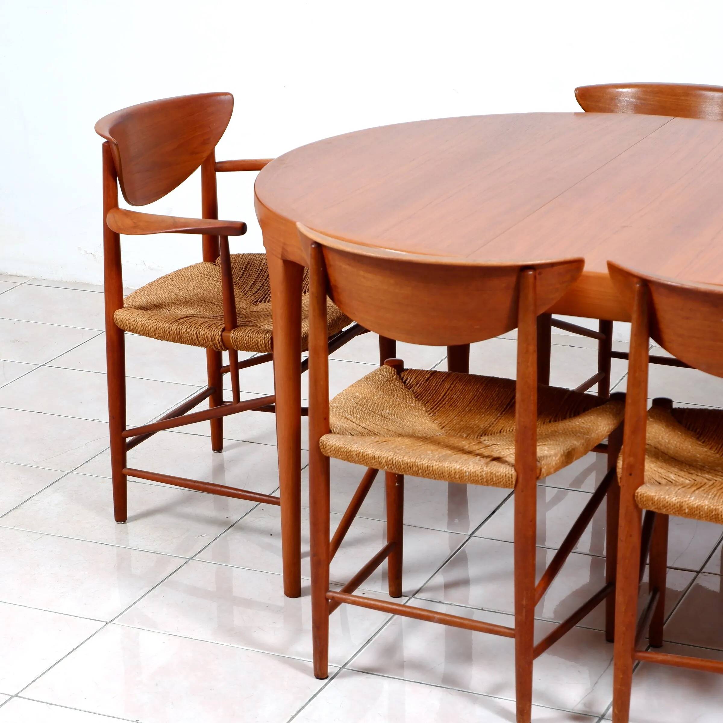 Round dining table in teak by Ib Kofod Larsen for Faarup Mobelfabrik