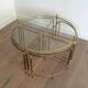 Round brass coffee table in neoclassical style