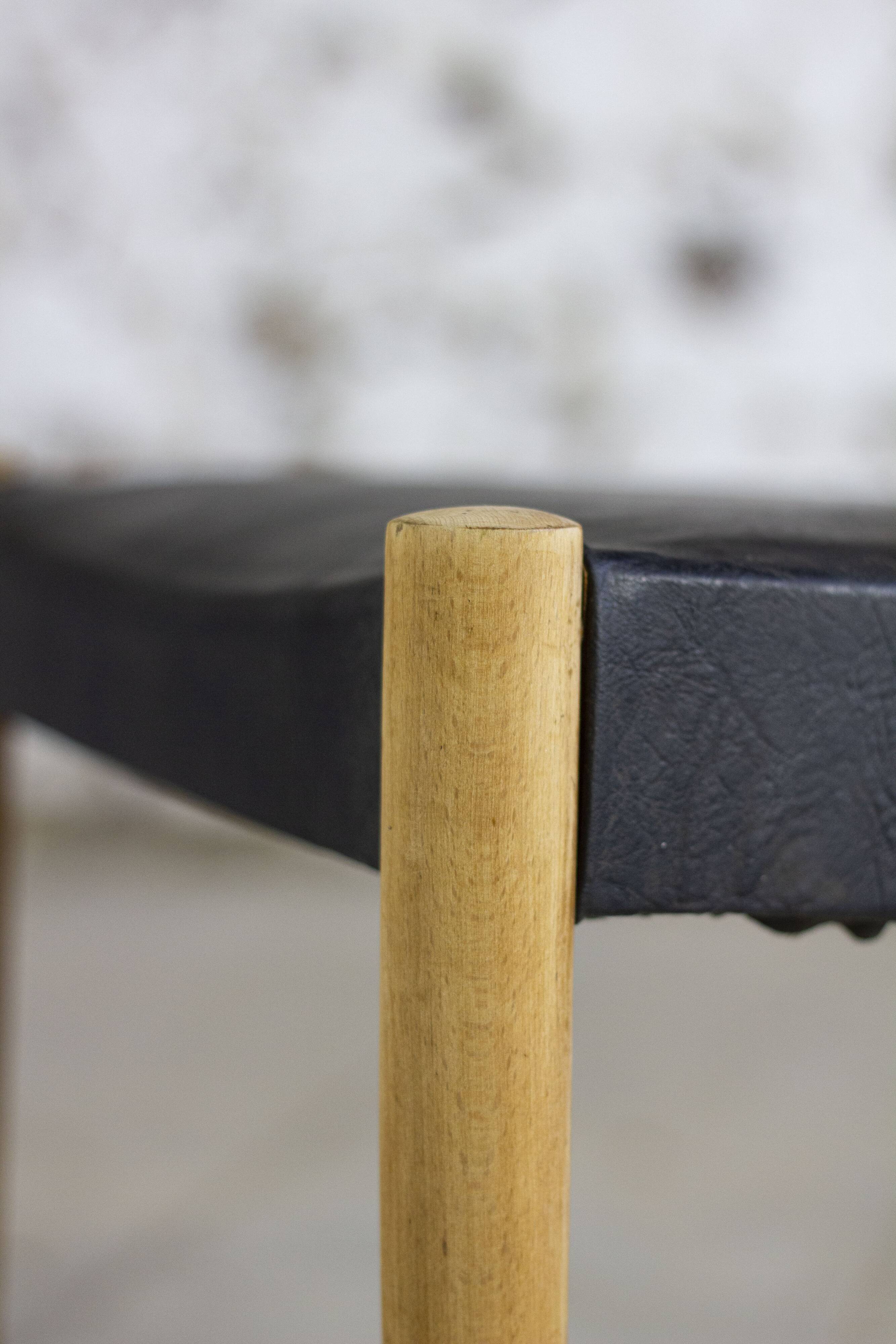 Scandinavian chair in teak and faux leather, 1960.