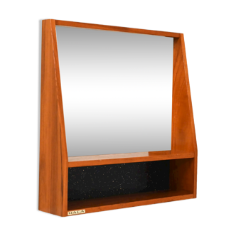 Mirror with holder