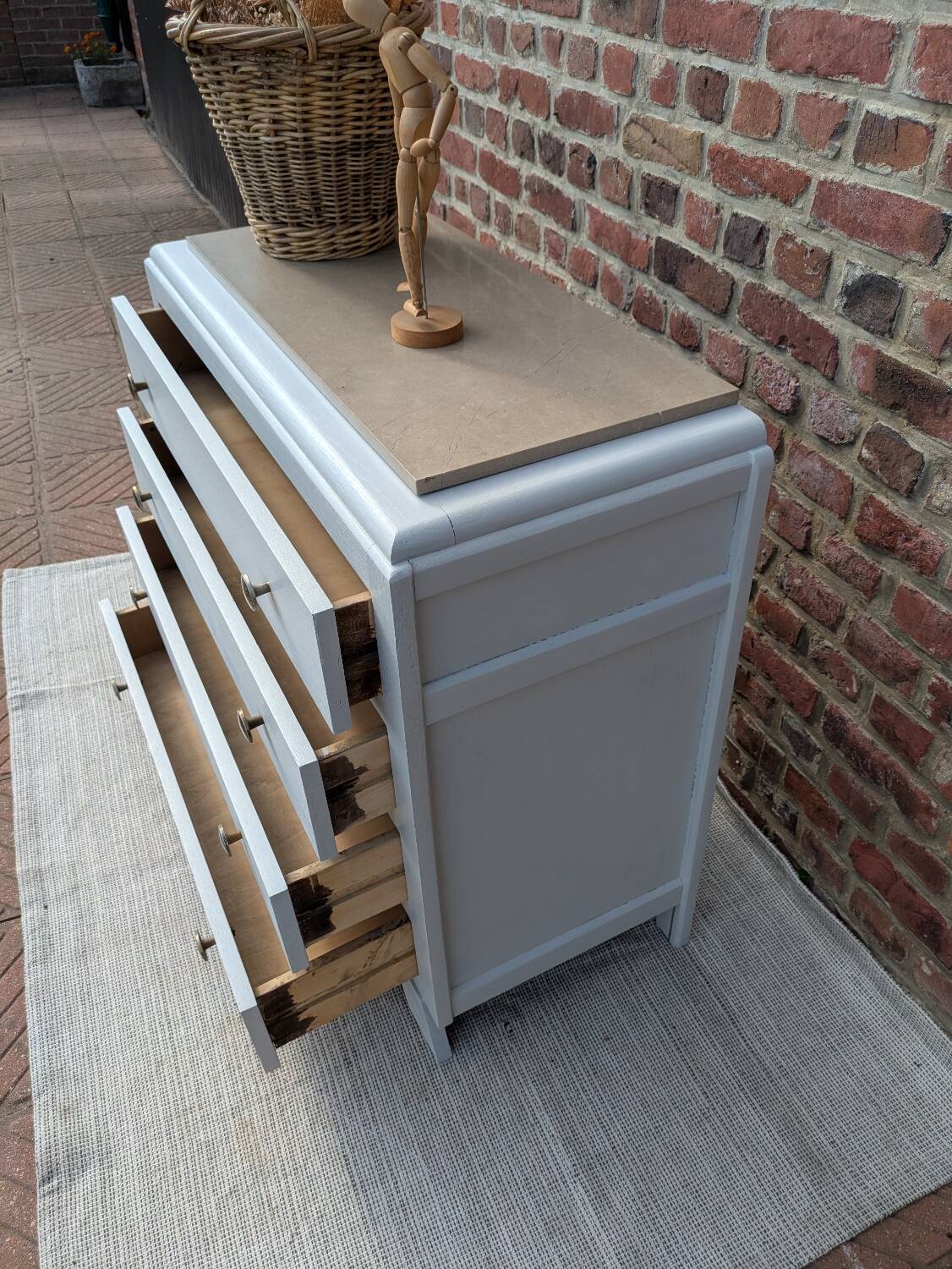 Marble-topped chest of drawers