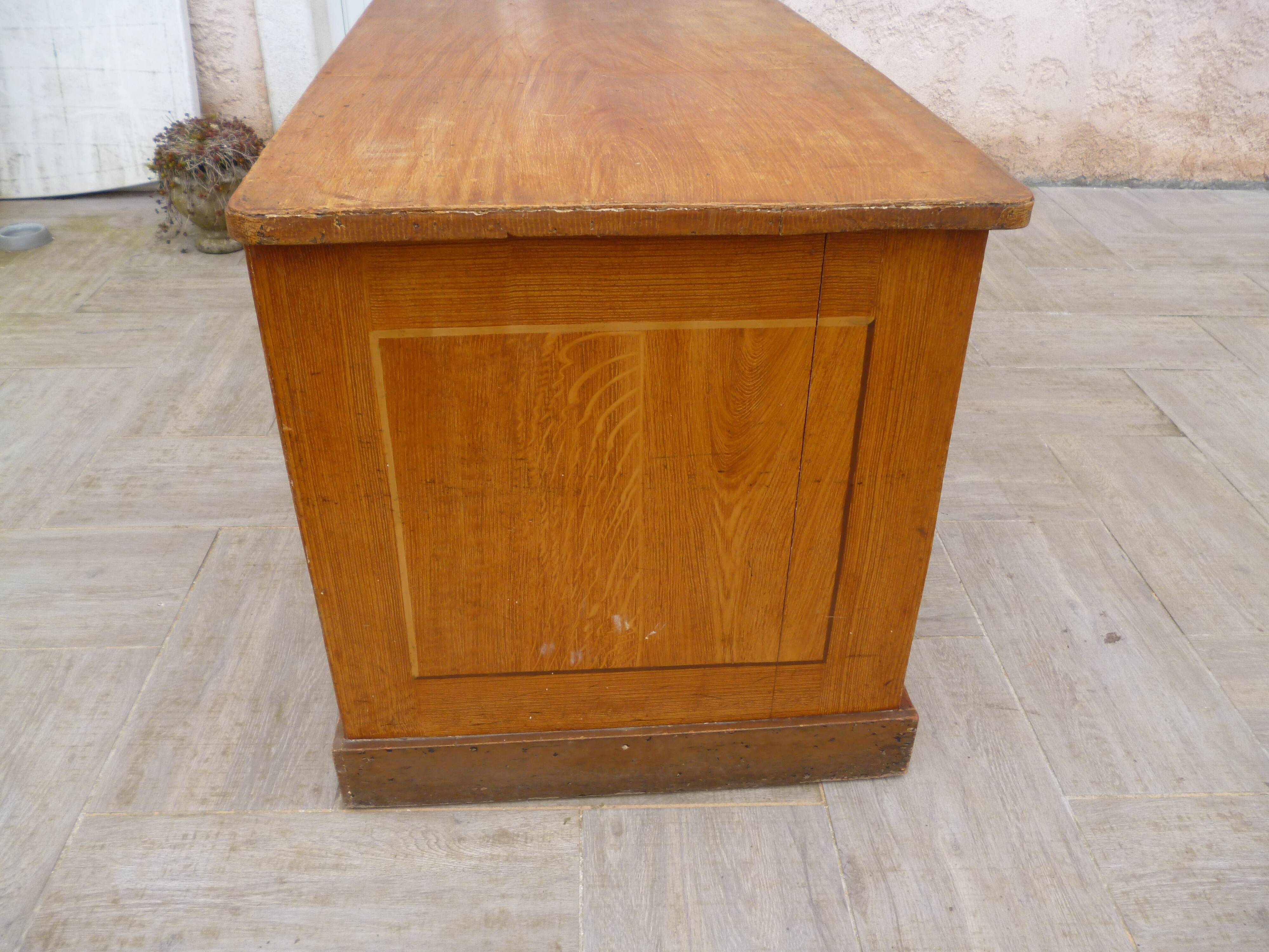 Trompe l'oeil painted store counter pitchpin style