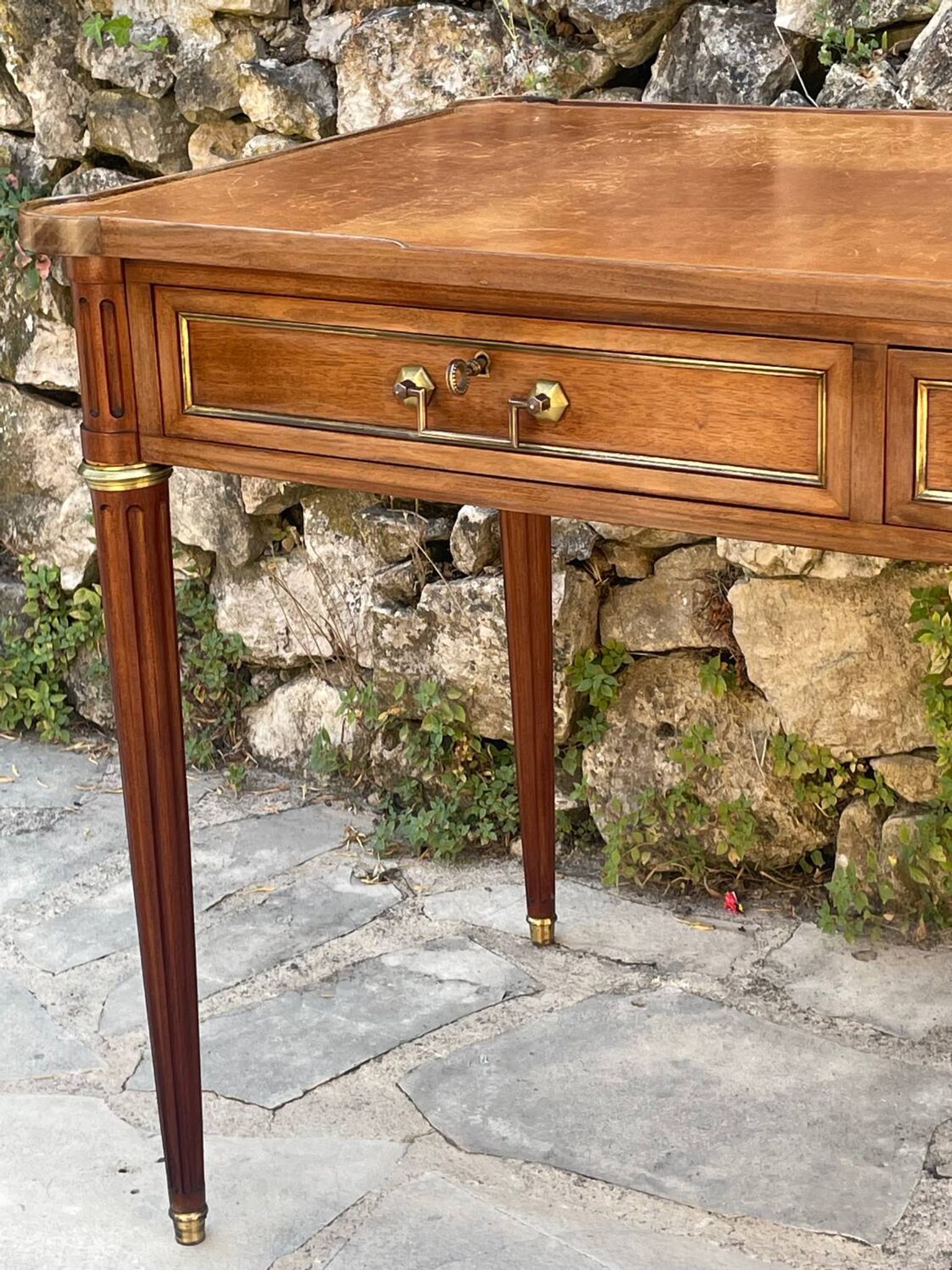 Louis XVI style mahogany flat desk from the late 19th century