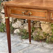 Louis XVI style mahogany flat desk from the late 19th century