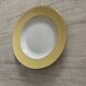 White and pastel yellow Amandinoise plates