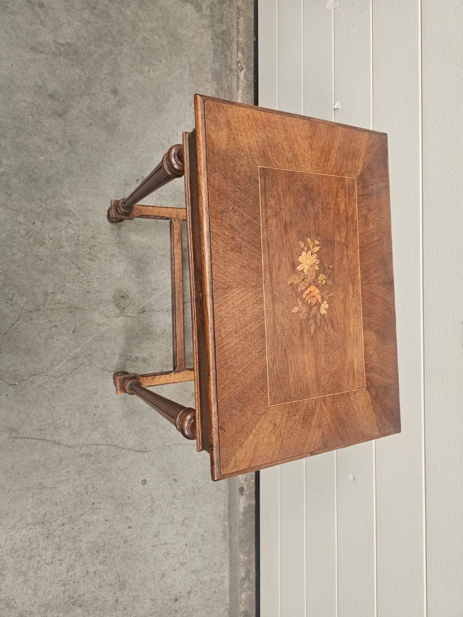 Antique dressing table with floral marquetry and integrated mirror.