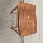 Antique dressing table with floral marquetry and integrated mirror.