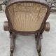 Vintage wooden and cane rocking chair