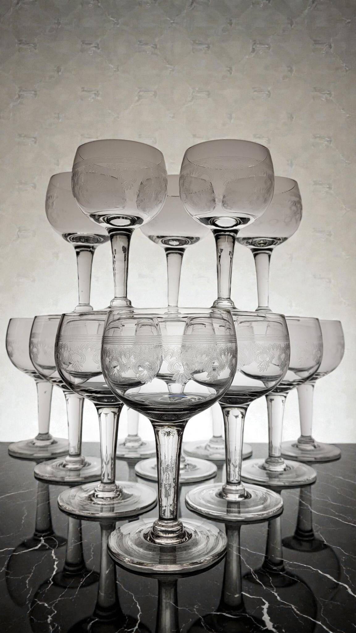 Page 4 of 8 9 guilloché wine glasses, early 20th century