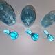 Trilogy of old blue glass bottles