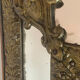 Mirror with brass repoussé frame