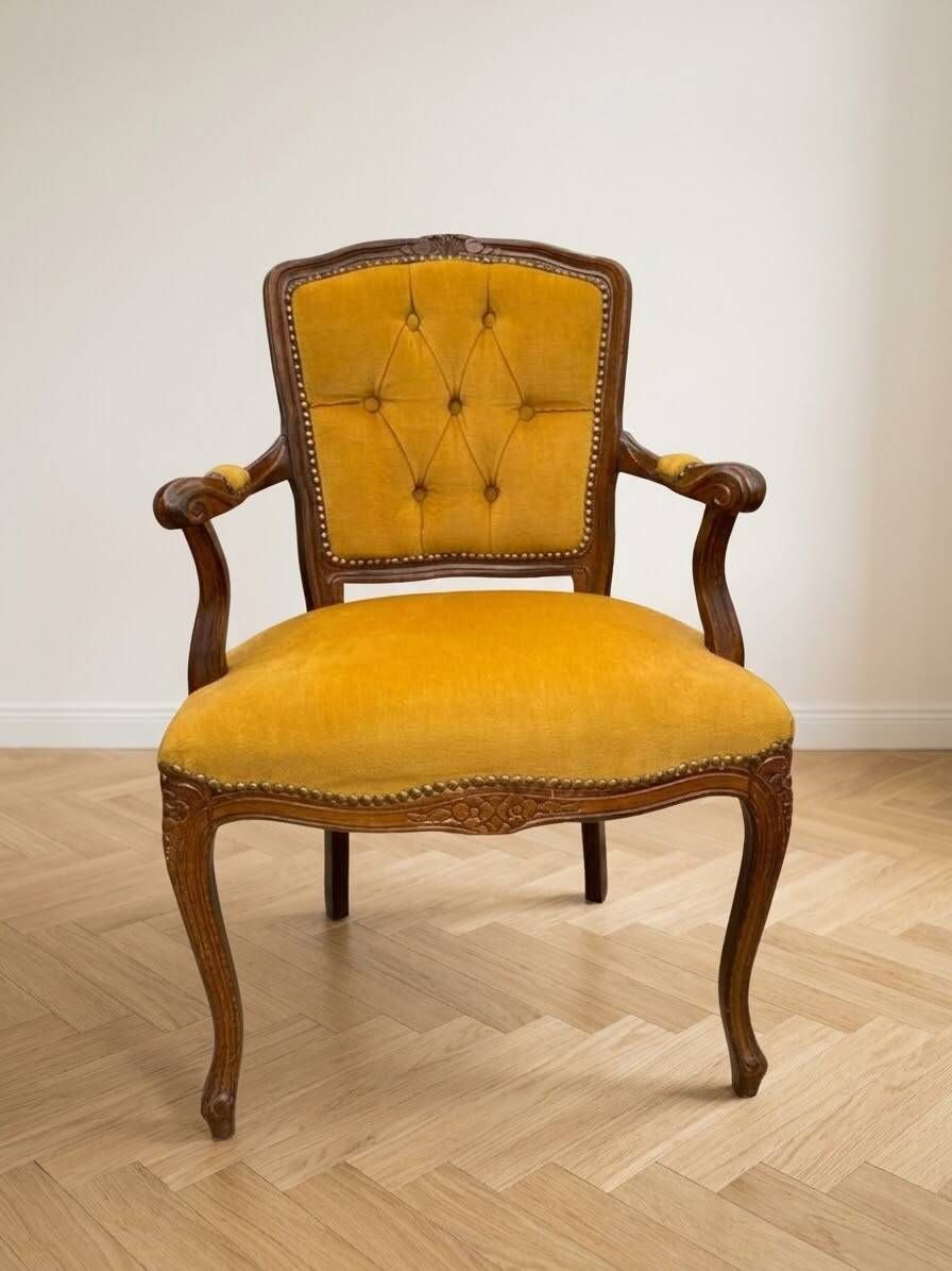 Louis XV style armchair in yellow velvet.