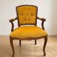Louis XV style armchair in yellow velvet.