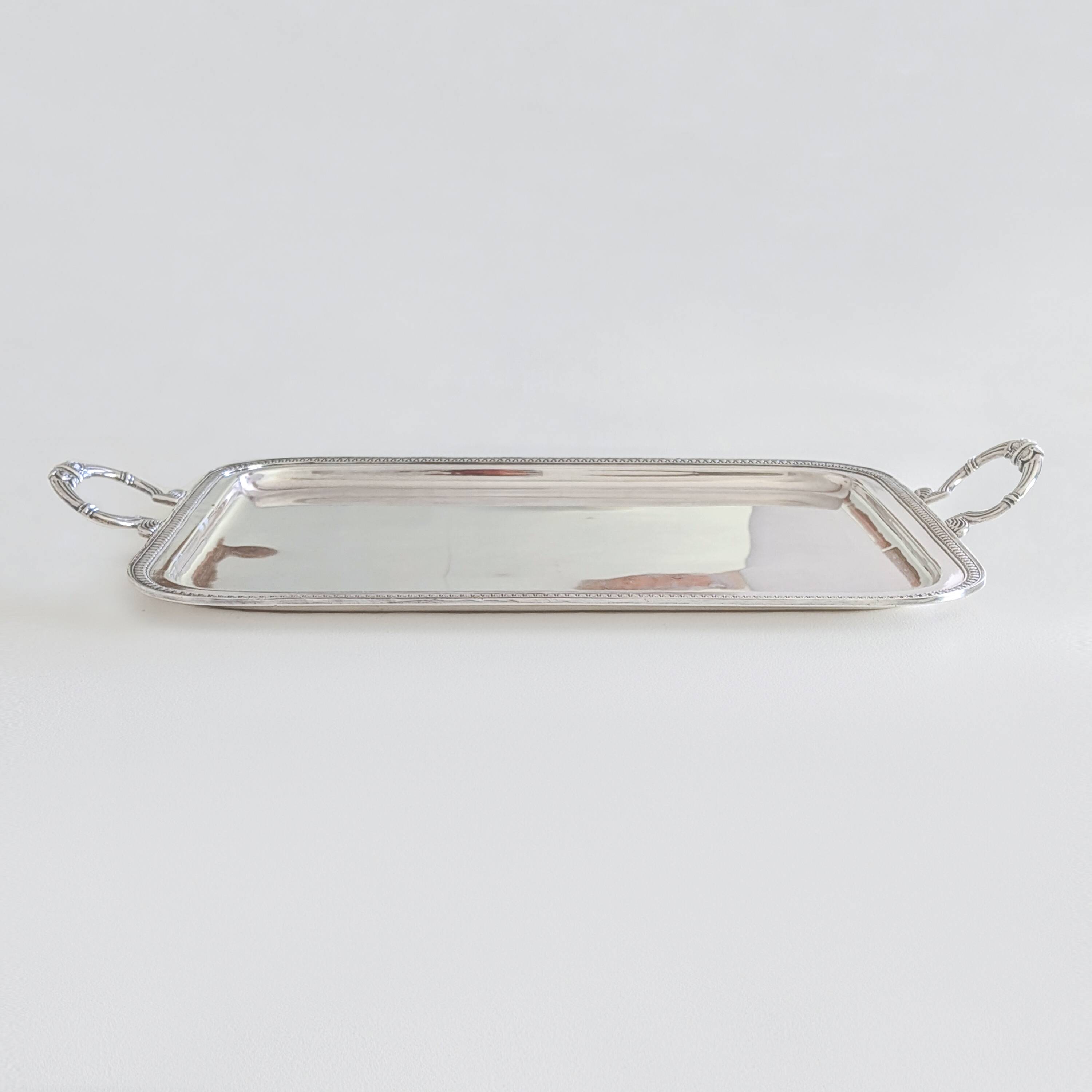 Large silver-plated service tray in Phoenix Louis XVI style.
