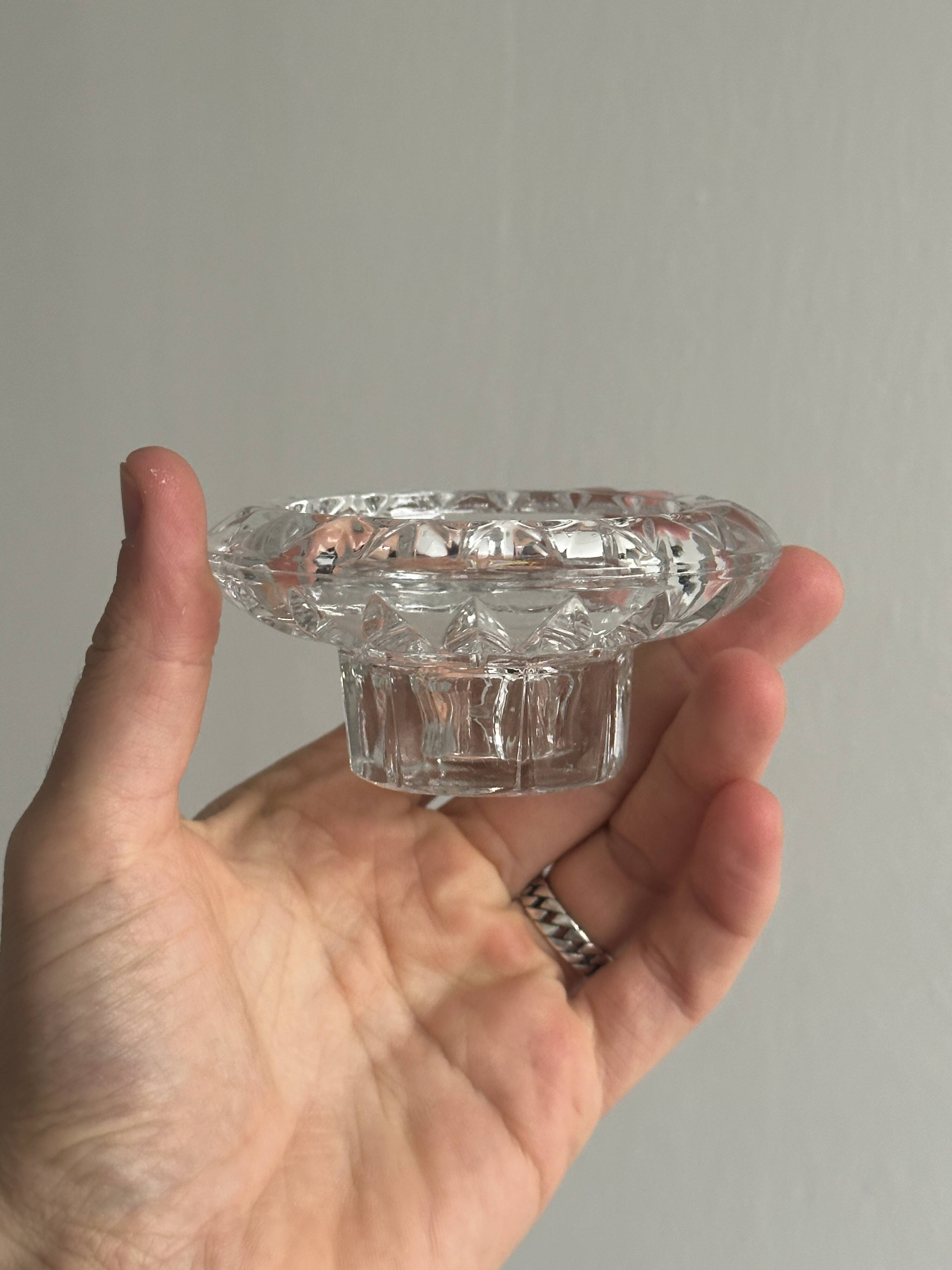 Duo of small candlesticks in chiseled glass