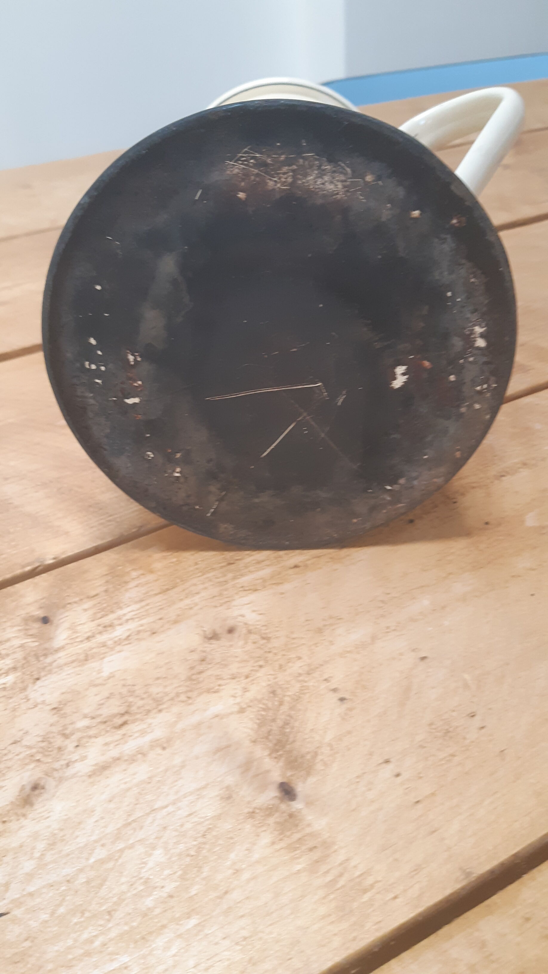 Cream metal teapot