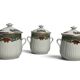 Set of three ribbed porcelain cream pots, 20th century.