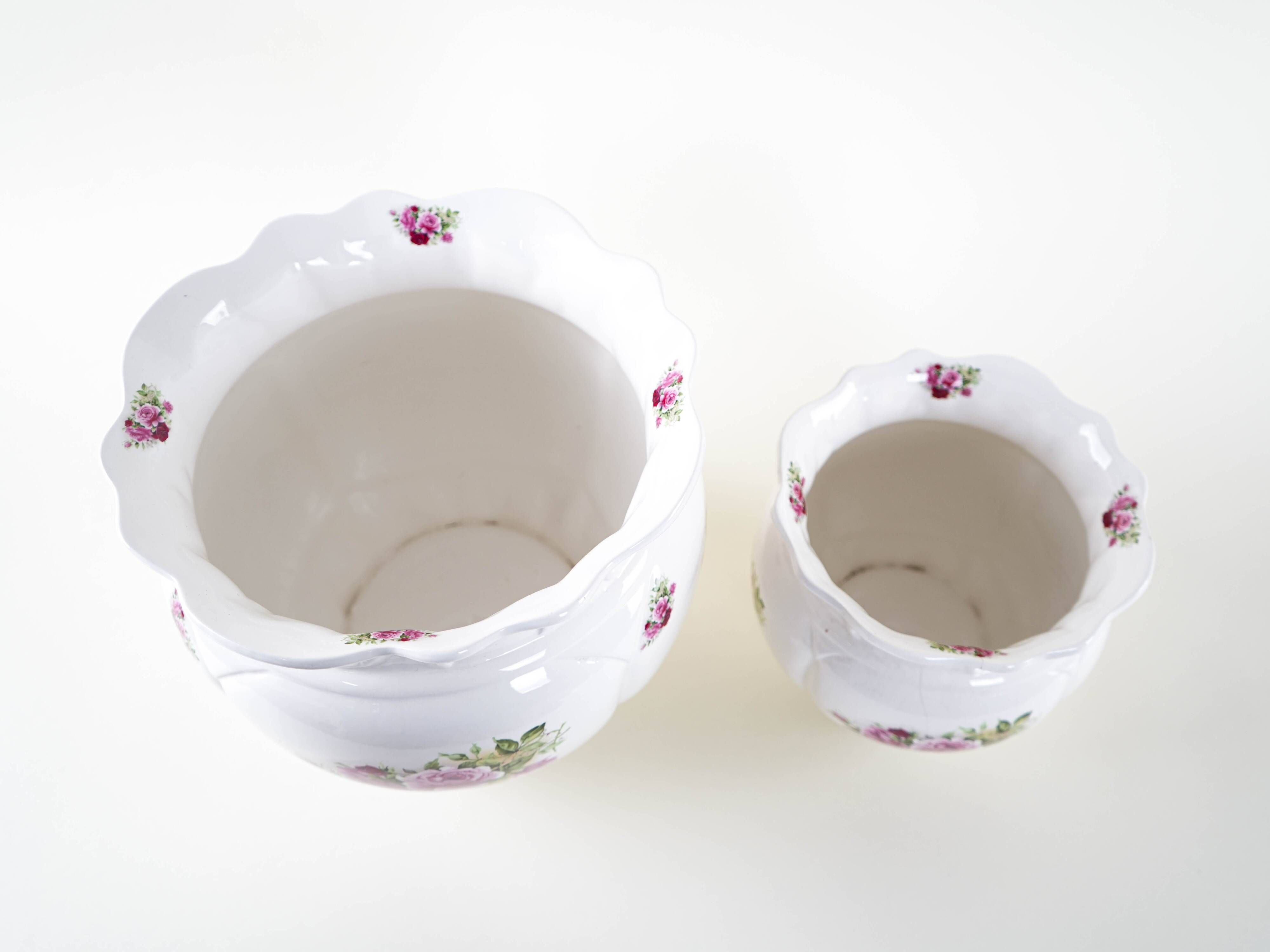 Pair of decorative ceramic vases with hand-painted roses, Art Deco style, European