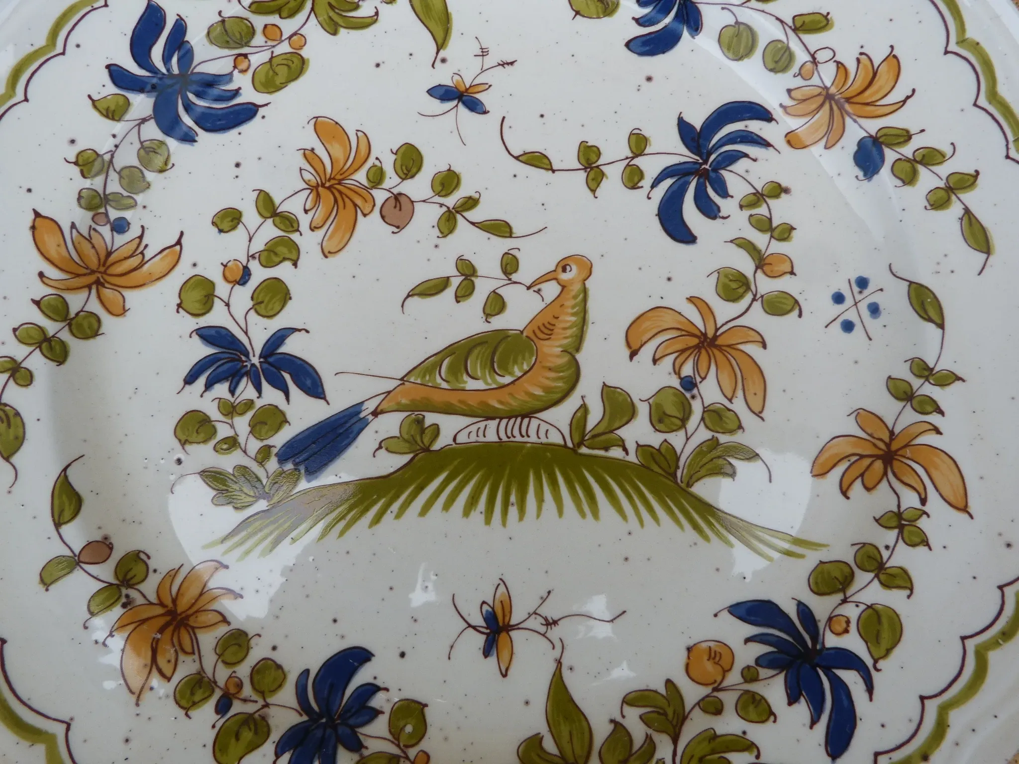 Plate reproduction of old Moustier from the 18th century.