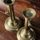 Pair of brass push-button candlesticks