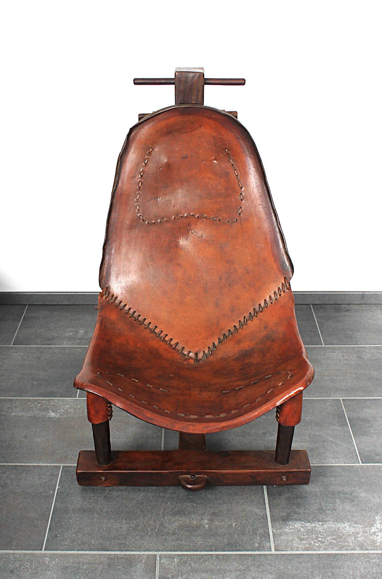 Brutalist oak lounge chair and ottoman, 1970s, set of 2