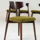Set of 4 dining chairs in sauvage green bouclé Scandinavian design.