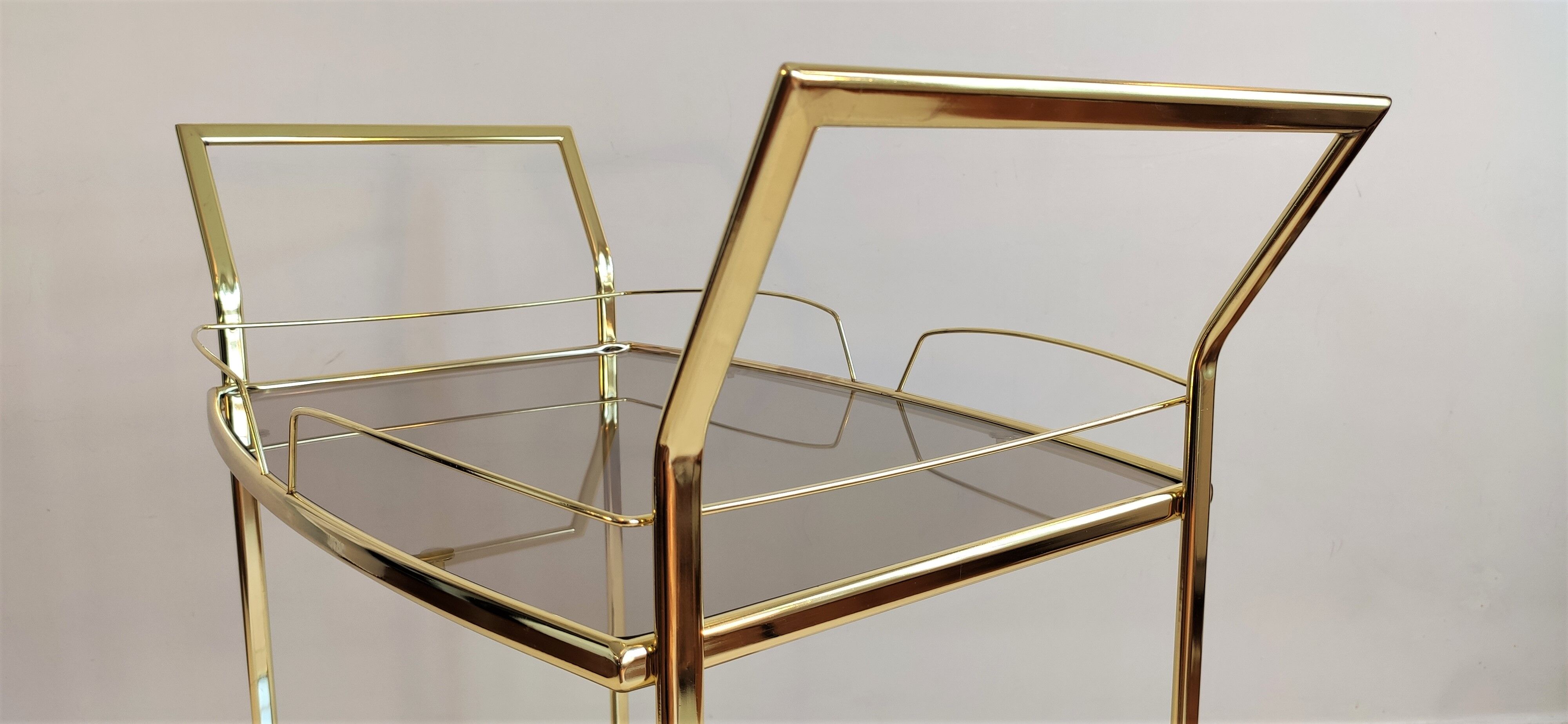 Serves golden trolley bar with wheels, in golden brass of the 80'S