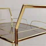 Serves golden trolley bar with wheels, in golden brass of the 80'S