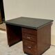 Modernist desk in wood and green moleskin upholstery