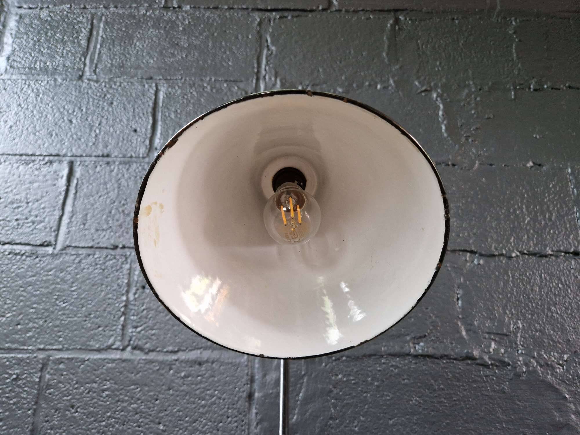 Industrial floor lamp in black lacquered metal and green enamelled sheet metal