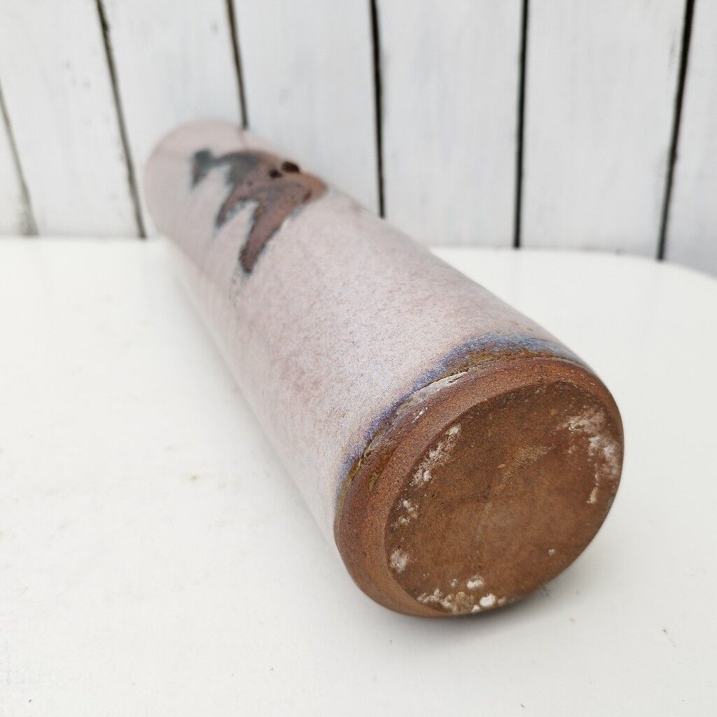 Enamelled ceramic roller vase signed