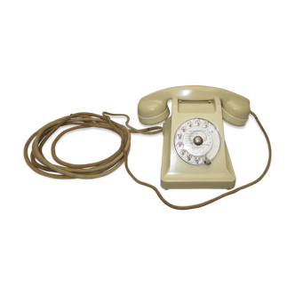 Vintage telephone in ivory-coloured bakelite