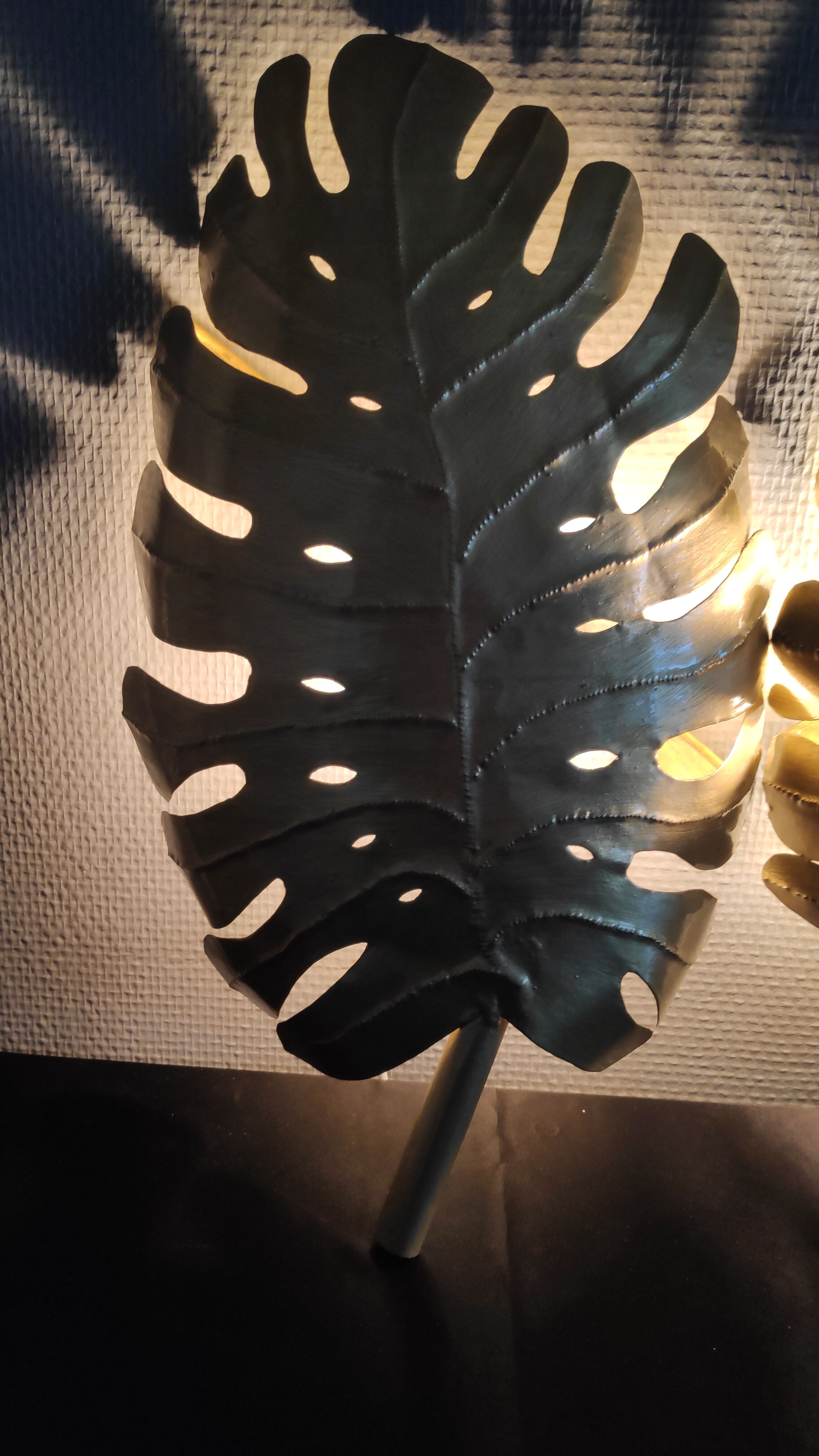 Pair of hammered gold metal wall lamps
