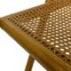 Chaise pliante vintage en bois avec assise en rotin design minimaliste des années 80