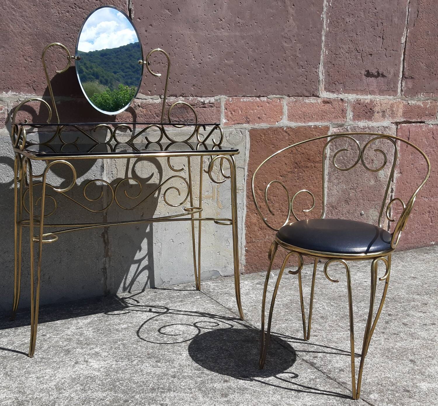Dressing table and chair in gilded metal and opaline glass.