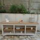 Craft furniture enhanced in pearl gray, shelves and top in raw wood.