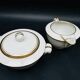 Limoges porcelain A. Vignaud sugar bowl and milk jug with gold trim