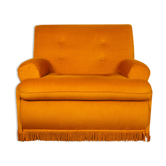 Armchair convertible into golden yellow velvet