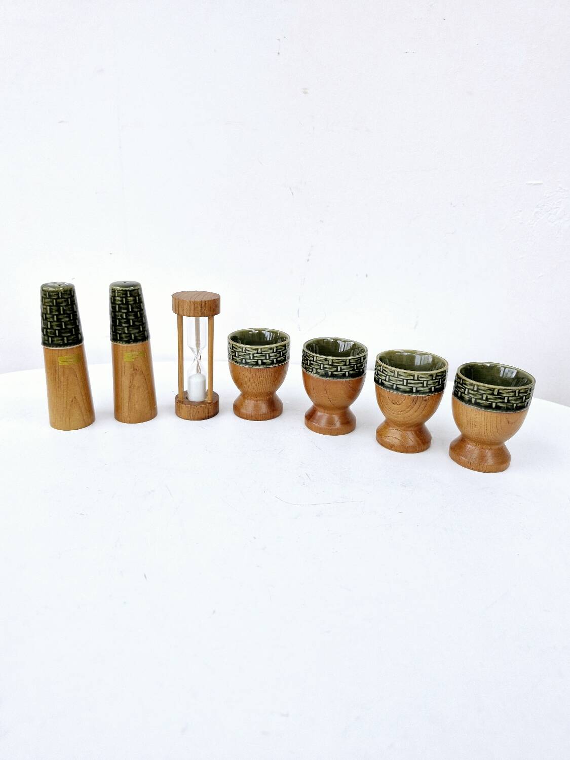 Set of 4 egg cups, salt shakers, pepper shakers and vintage wood and ceramic timer