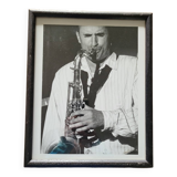 Framed and signed photo of saxophonist musician