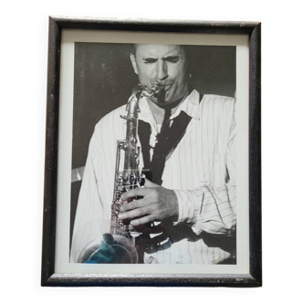 Framed and signed photo of saxophonist musician