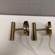 A set of stylish brass wall lamps from Danish Darø