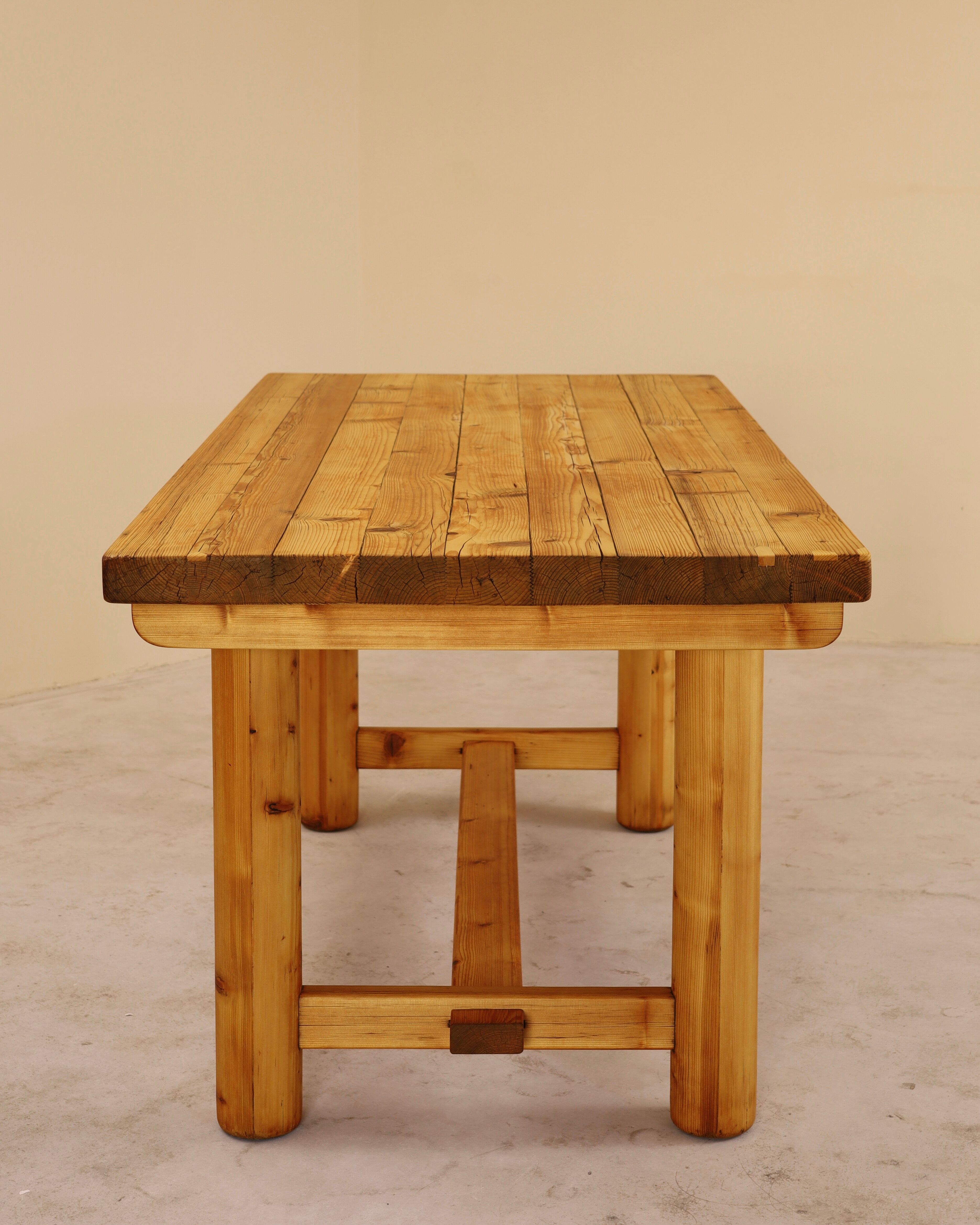 Solid pine table, attributed to Georges Robert, France, 1960s.